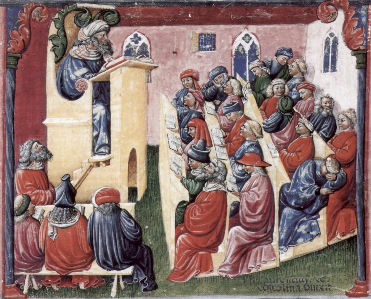 Manuscript painting: a teacher reads from a book at a raised lectern to rows of students, some following in their own books, some talking, one asleep